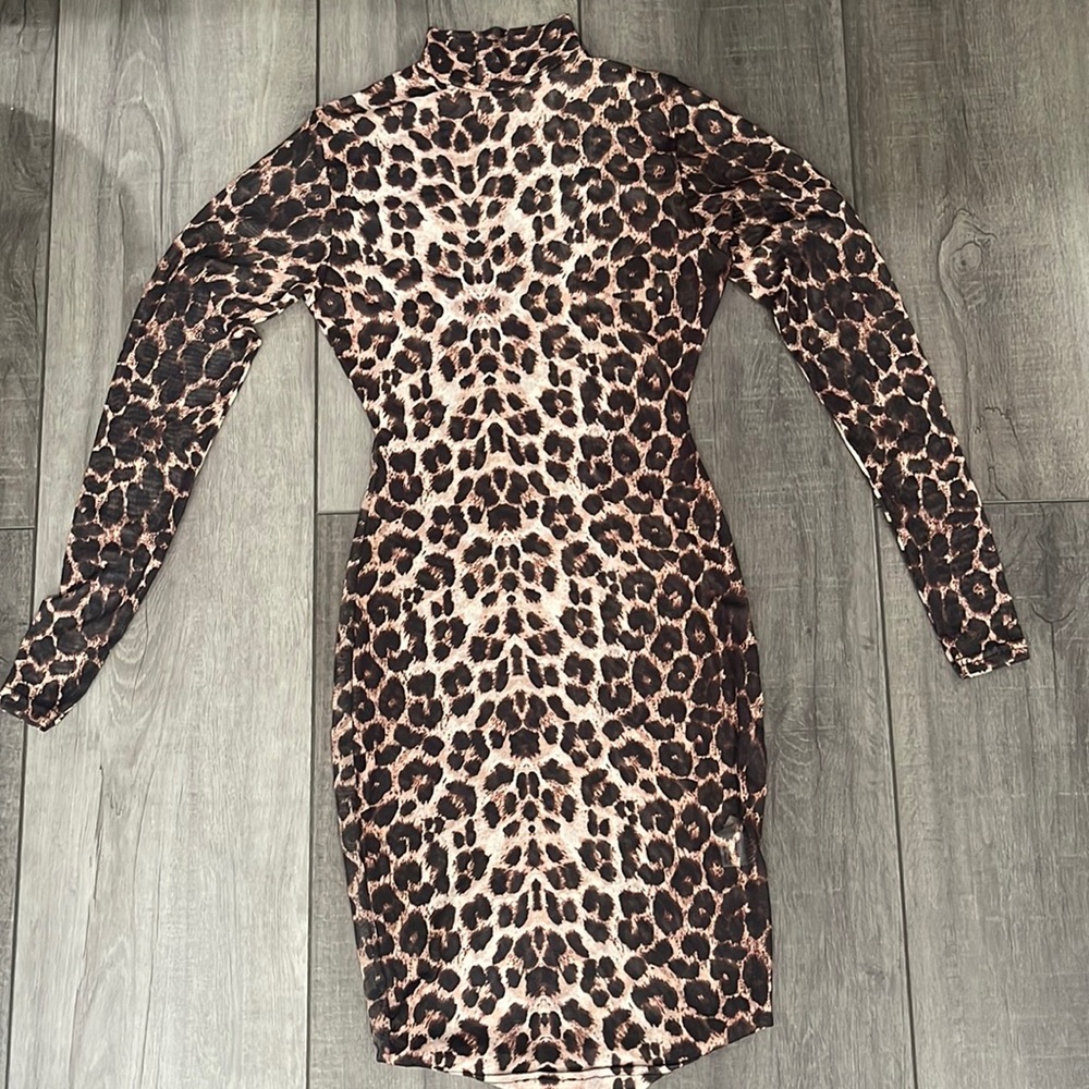 Mesh animal print mini dress. Runs small